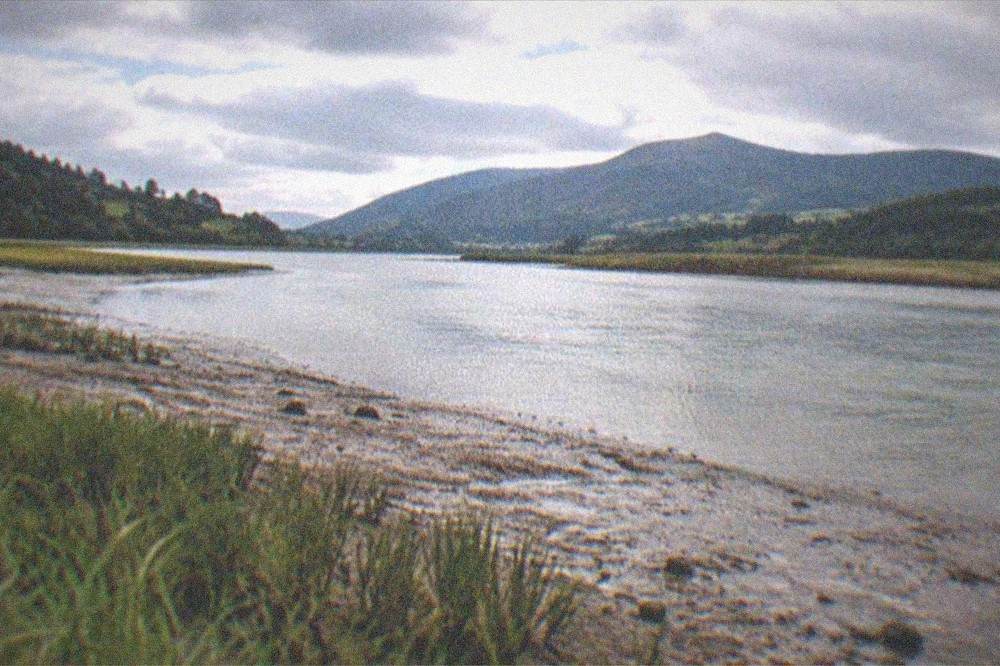Evening light over the Urdaibai estuary with the hills of the Biosphere Reserve in the background