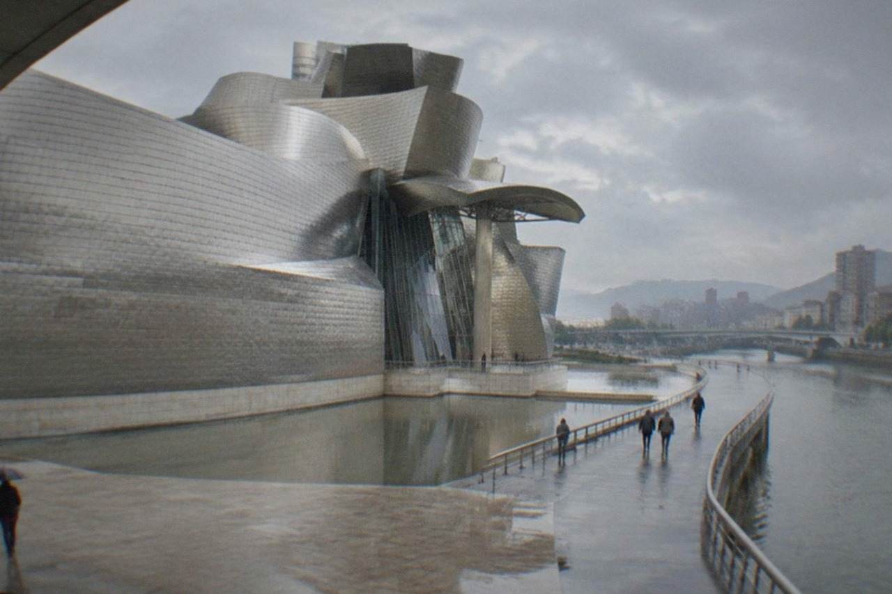 Step-free riverside promenade beside the Guggenheim Museum in Bilbao on a calm morning