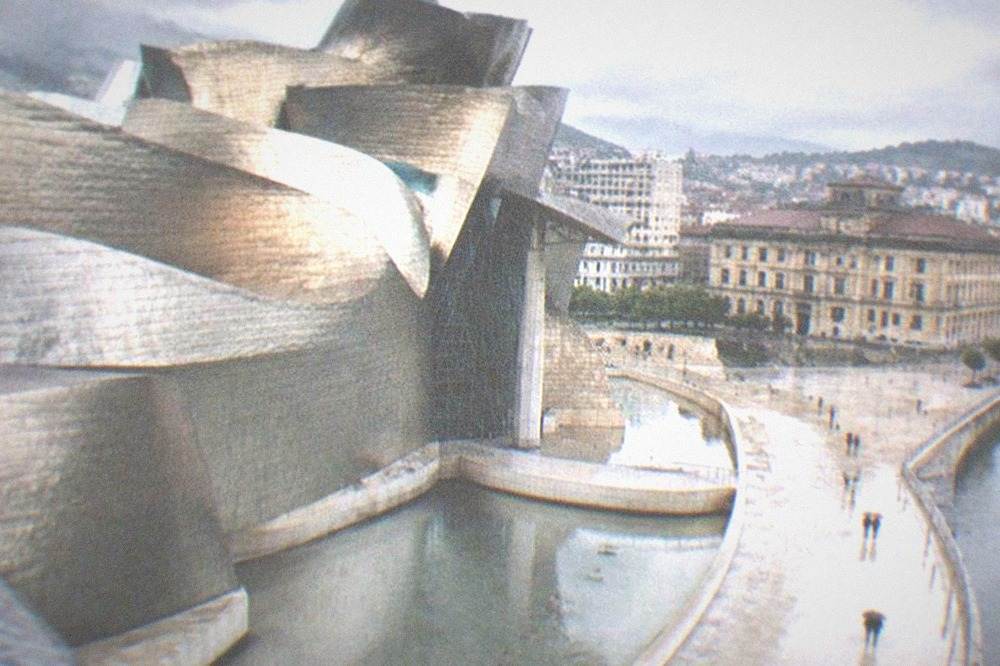 An old stone building facade of the Basque Museum in Bilbao's old town plaza