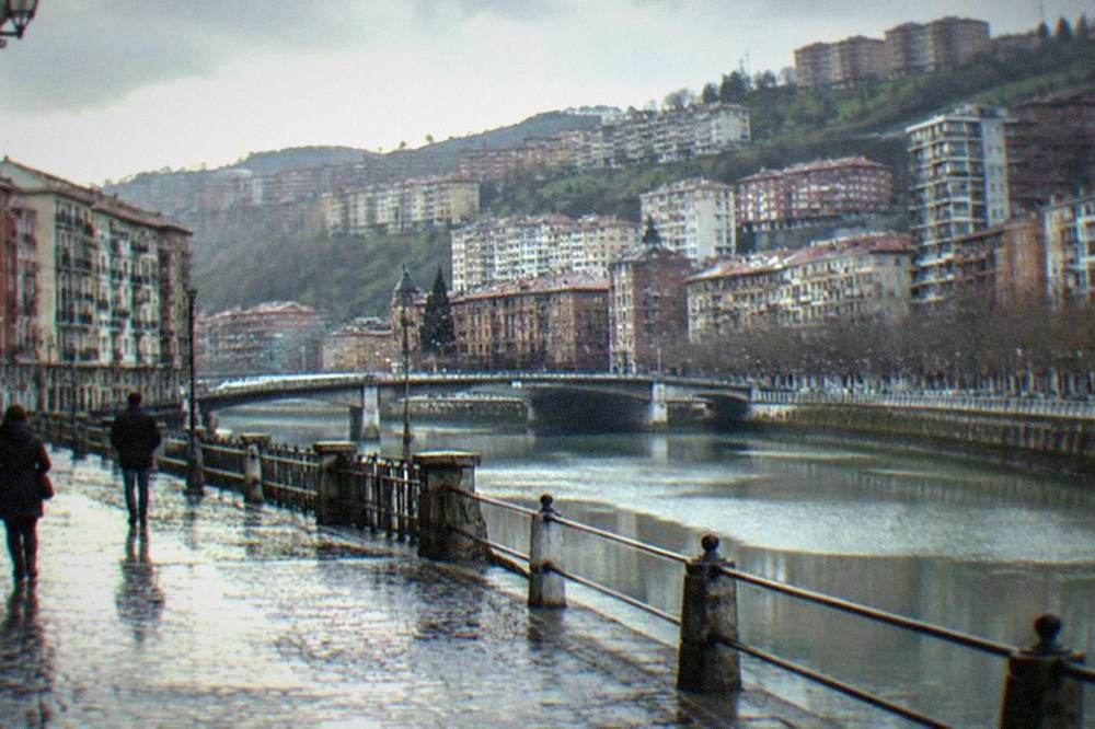 Cobblestone street in Bilbao's Old Town glistening after rain
