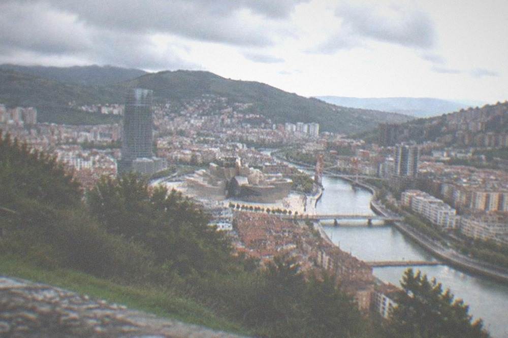 View over Bilbao's rooftops and river from the Artxanda hillside viewpoint