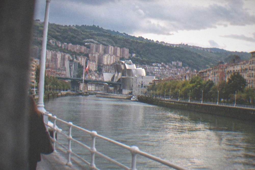 The Bay of Biscay coastline near Bilbao under a mix of sun and cloud