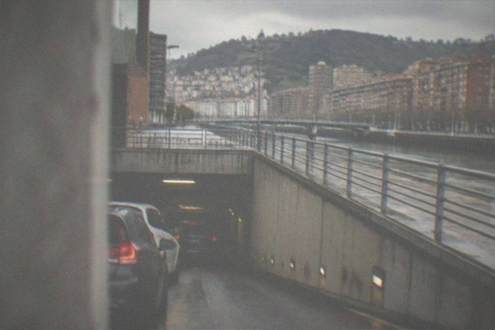 Rowed cars parked in an underground car park entrance in central Bilbao