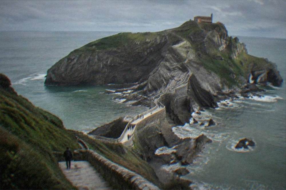 Coastal viewpoint with the islet and stone causeway of San Juan de Gaztelugatxe near Bilbao