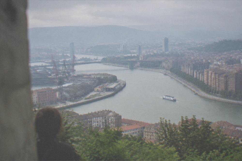 View over Bilbao's rooftops and the Nervion river from the Artxanda hillside