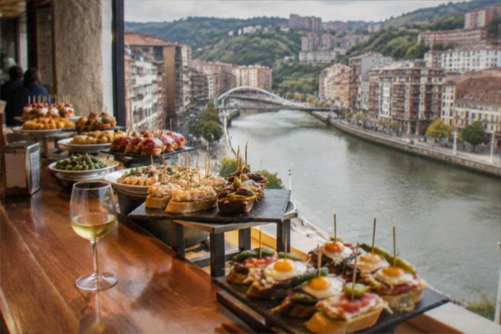 A pintxos bar counter in Bilbao loaded with small skewers and tapas