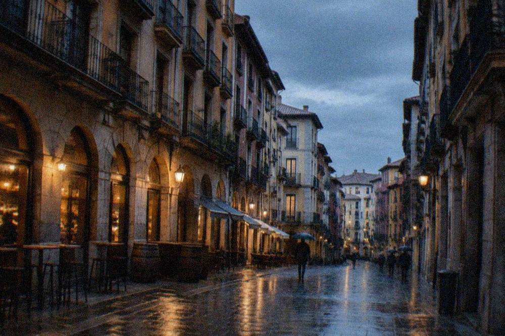 Rain falling on the tiled roofs and narrow streets of Bilbao's Casco Viejo old quarter