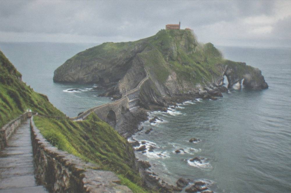 The rocky islet of San Juan de Gaztelugatxe with its stone causeway reaching from the Basque coastline